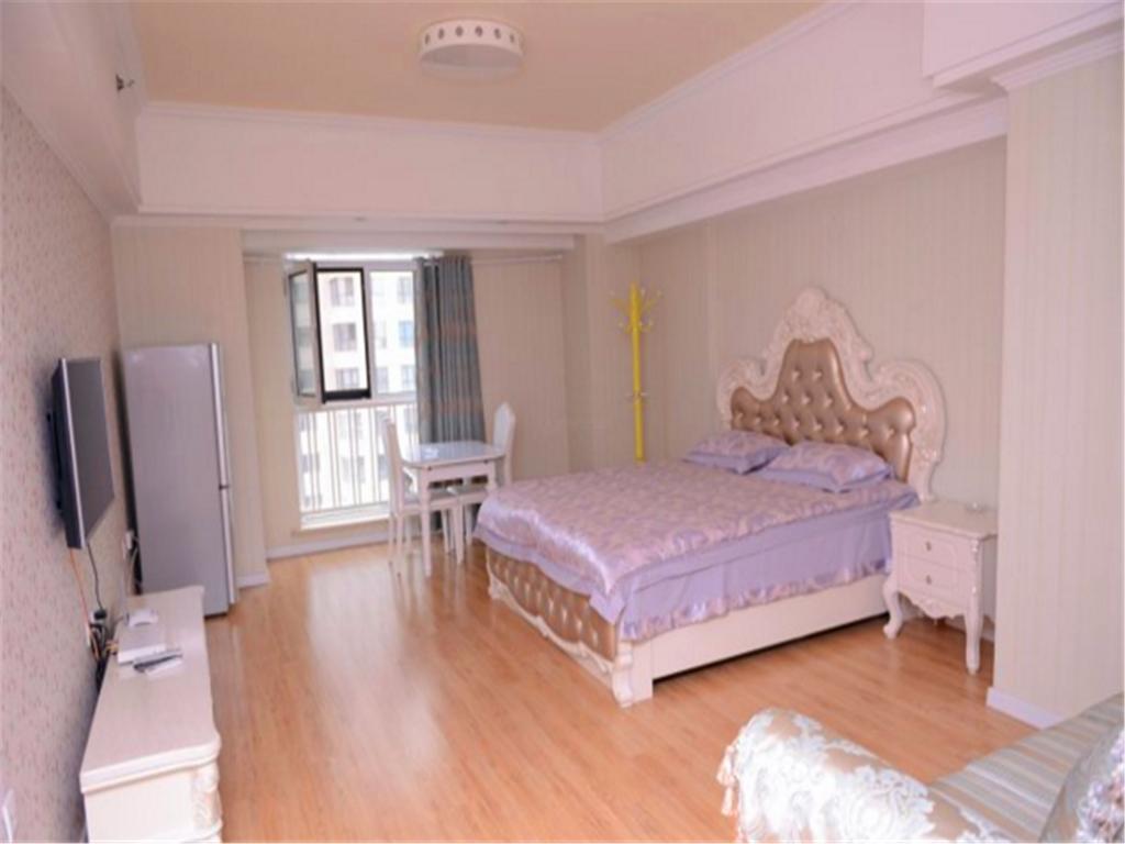 Green Express Apartment Harbin West Railway Station Oda fotoğraf