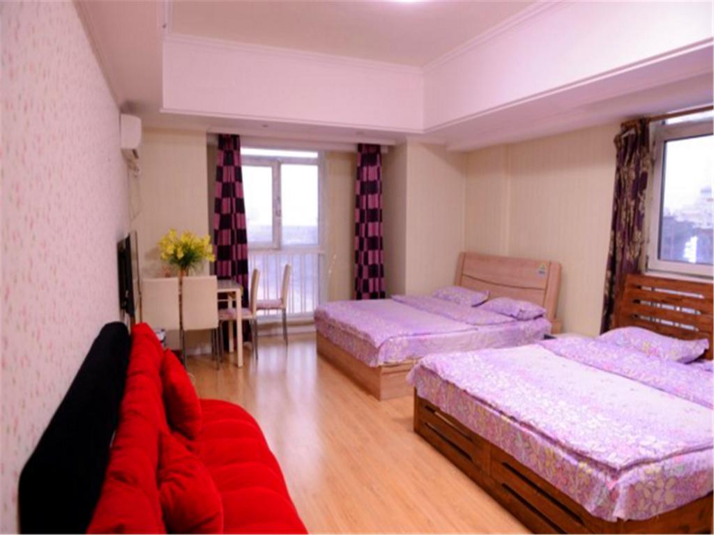 Green Express Apartment Harbin West Railway Station Oda fotoğraf