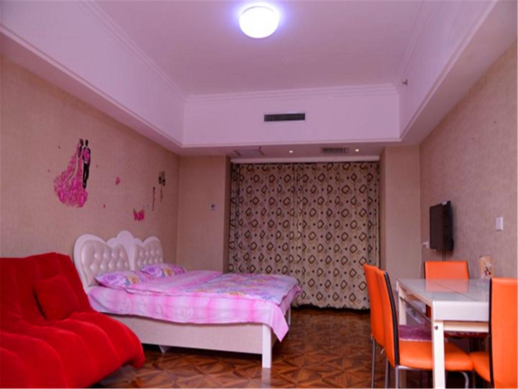 Green Express Apartment Harbin West Railway Station Oda fotoğraf